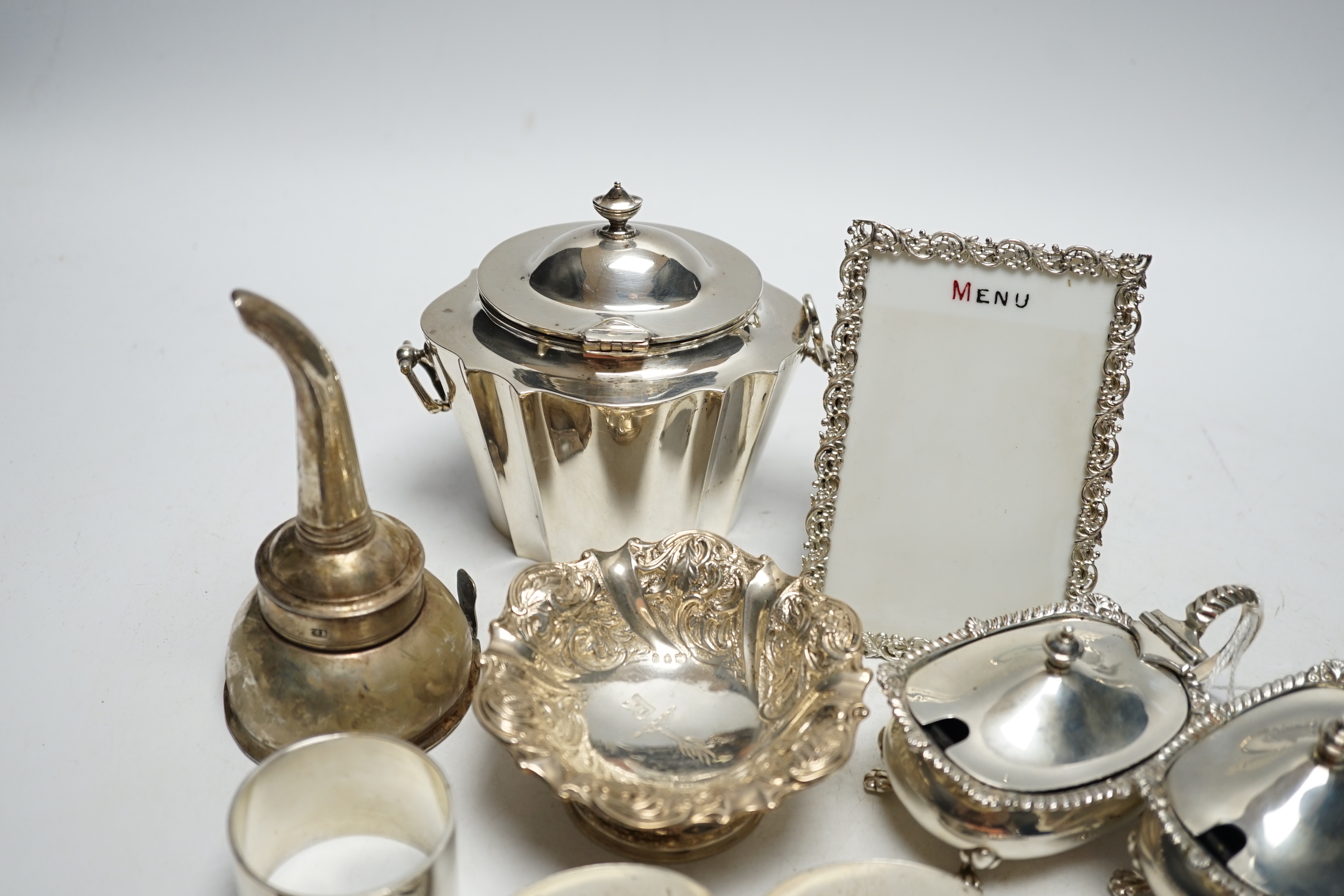 Sundry small silver etc. including an Edwardian silver tea caddy, London, 1902, 98mm, napkin rings including Persian white metal, a tortoiseshell letter clip, thimbles, condiments etc.